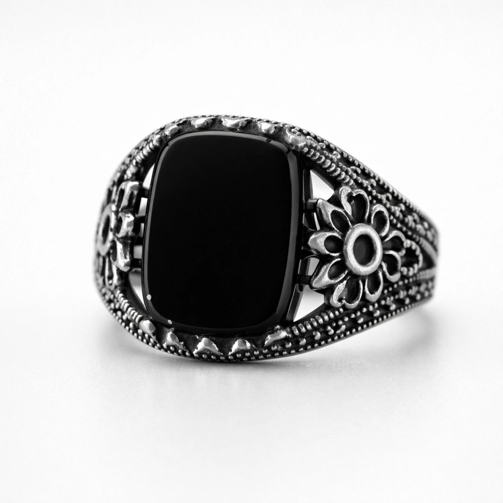 Men’s 925 sterling silver ring with smooth midnight black stone and floral crest side detailing