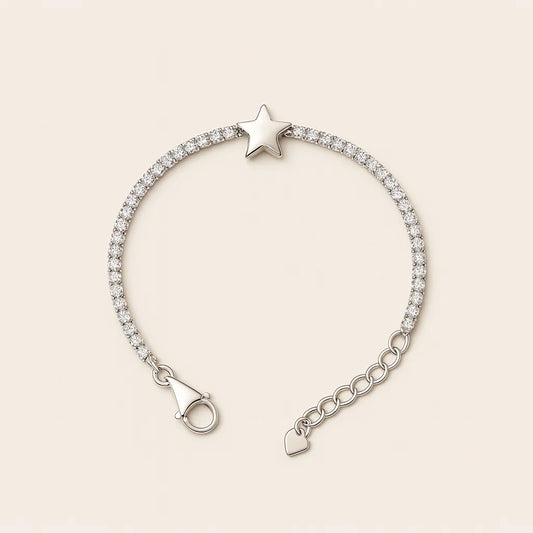 Silver bracelet with star and heart charms on a beige background
