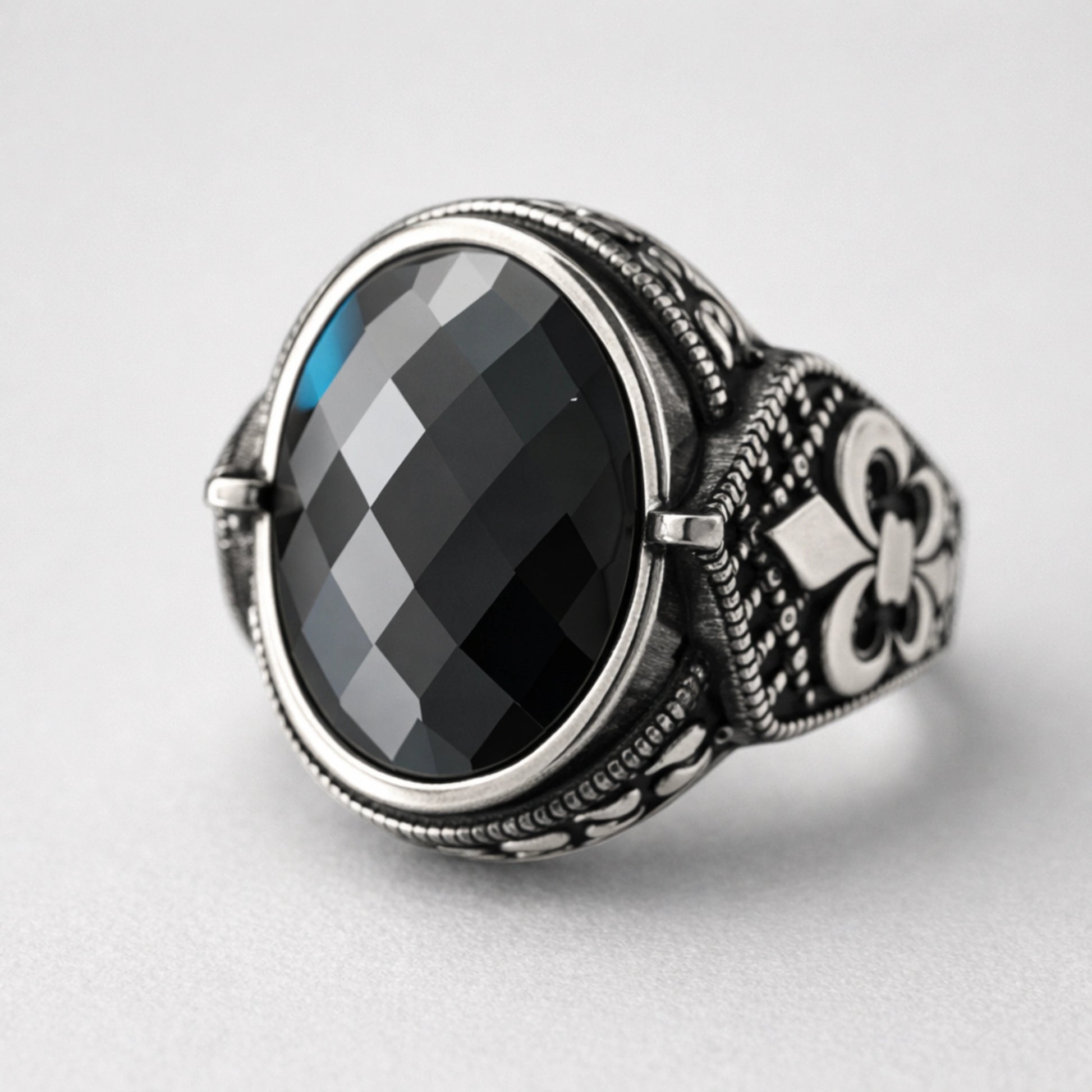 Men’s 925 sterling silver ring with faceted jet-black stone and vintage engraved design