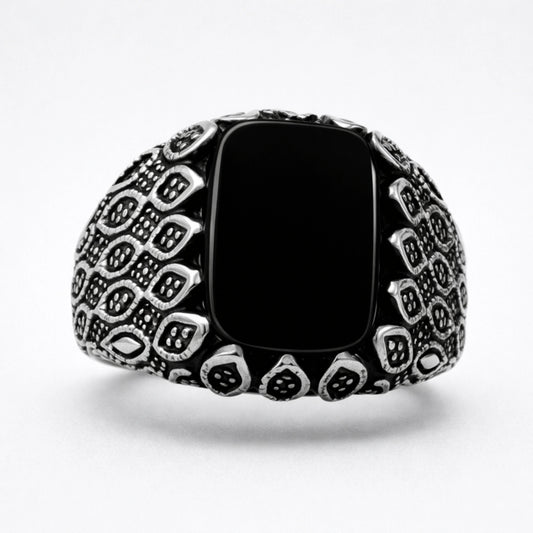 Men’s 925 sterling silver ring with glossy black rectangular stone and textured armor-style band