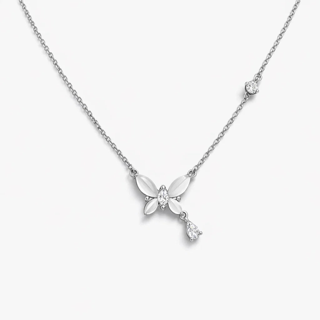 Silver necklace with a butterfly pendant on a white background